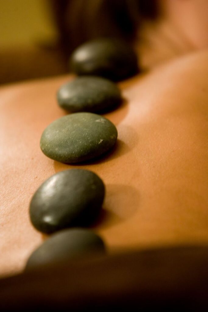 Relax with a hot stone massage from Bella on the Bay_